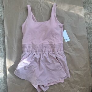 Blush Silk Yogalicious Lix Patti Romper 
Size Large